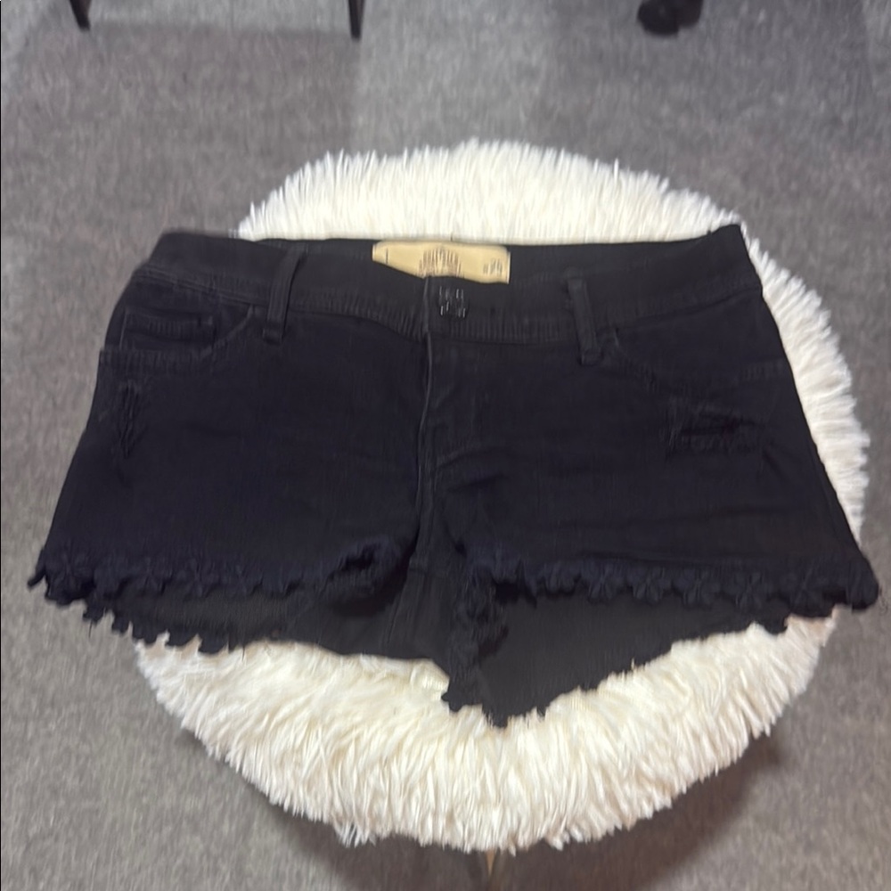 Black Jean Shorts with Distressed Hem and Slim Fit